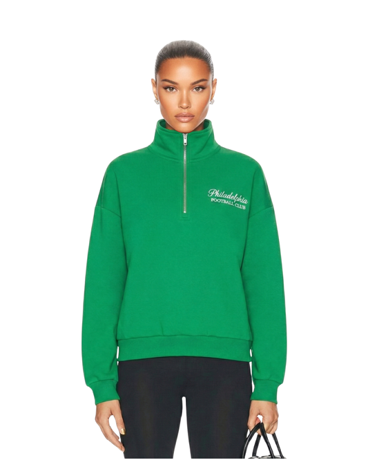 Model wearing South & Green's Philadelphia Football Club Quarter Zip Sweater.