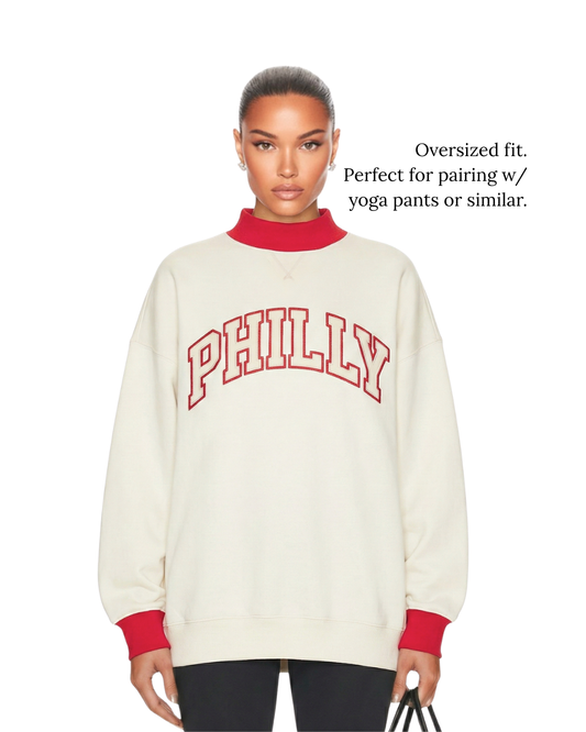 Model demonstrating an oversized fitment of the Heritage PHILLY Varsity Mockneck.