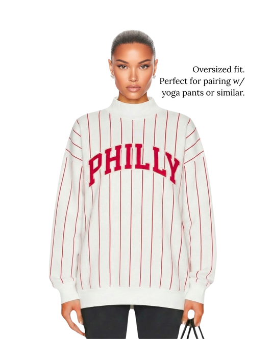 Model demonstrating an oversized fit of S&G's Pinstripe PHILLY Varsity Mockneck.