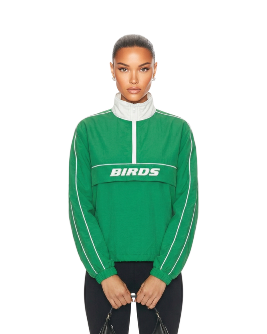 Model wearing a zipped-up South & Green Limited Edition Kelly Green BIRDS Windbreaker with a pair of Black Yoga Pants.