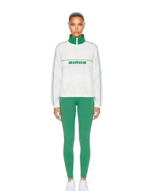 Model wearing a sized-down South & Green BIRDS Windbreaker with a pair of South & Green Kelly Green Yoga Pants.