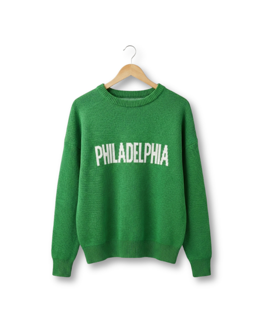 South & Green's Unisex Knit PHILADELPHIA Essential Sweater on a hanger against a white background.