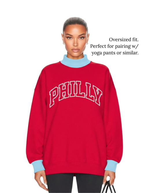 Model demonstrating an oversized fitment of S&G's Starter PHILLY Varsity Mockneck.